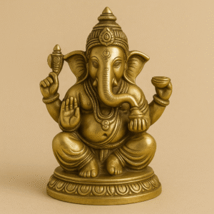 "DivyaSangrah brass Lord Ganesha idol for pooja, featuring intricate detailing and traditional design, seated on a lotus pedestal against a beige background."