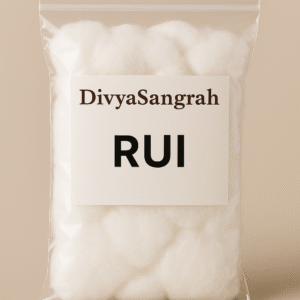 "DivyaSangrah branded transparent ziplock pouch filled with soft Rui cotton, used in Hindu puja rituals for lighting diyas and performing aarti, placed against a neutral beige background."