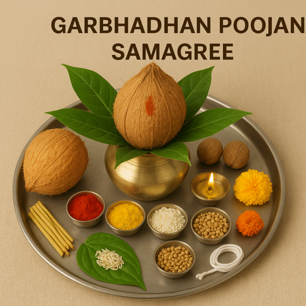 "Garbhadhana Poojan Samagree arranged on a steel plate, including kalash with coconut and mango leaves, kumkum, haldi, rice, coriander seeds, betel leaf, incense sticks, diya, thread, nuts, and marigold flowers—used in the Hindu conception ritual."